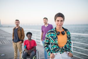 A diverse group of friends enjoying a day out by the sea in Portugal.
