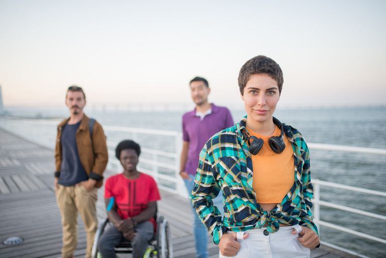 A diverse group of friends enjoying a day out by the sea in Portugal.