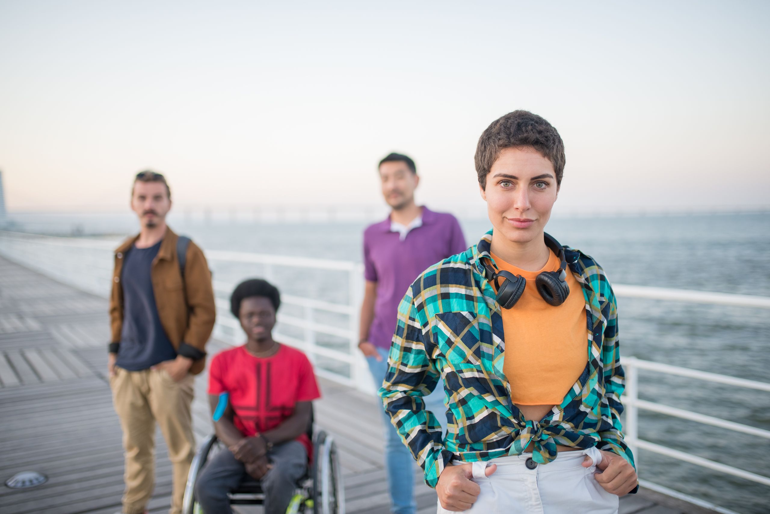 A diverse group of friends enjoying a day out by the sea in Portugal.